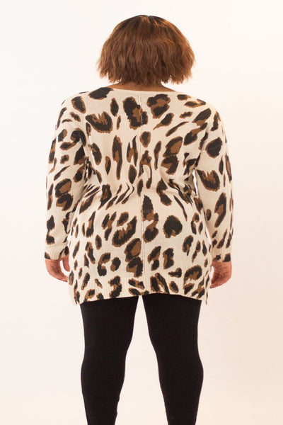 Leopard Print, loose fit, v-neck, tunic sweater with slide slits.